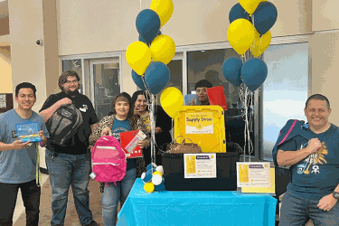 Staff showing donations